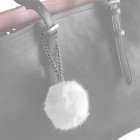  fluffy sleutelhanger is een trendy begeleider aan uw handtas